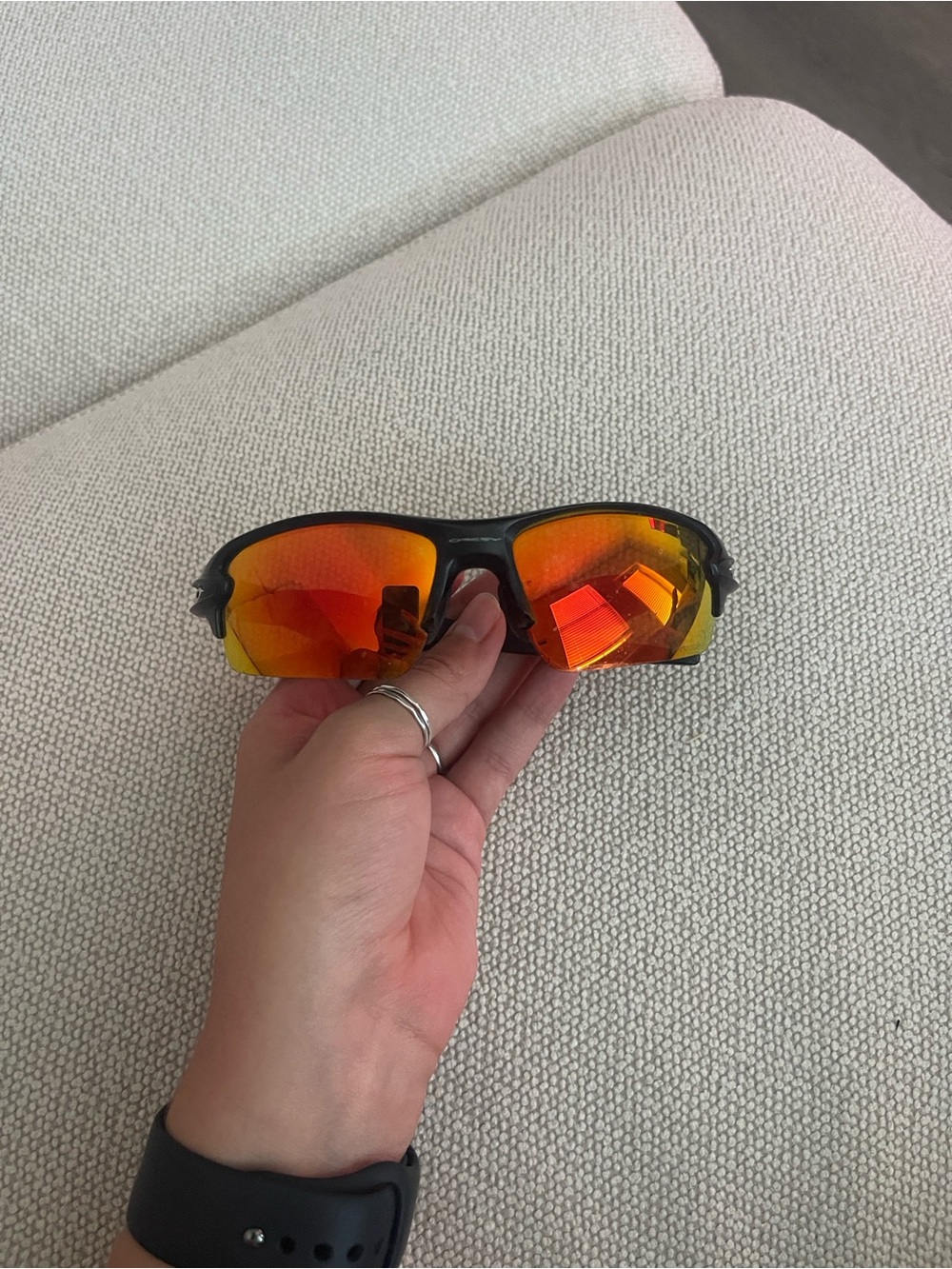 Oakley Sunglasses Black Frame with Red Orange Mirrored Lenses